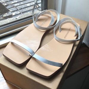 Mari Giudicelli ankle strap sandals.